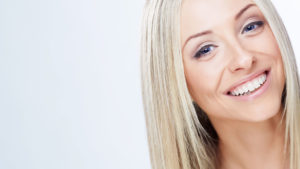 Woman with perfect teeth smiling