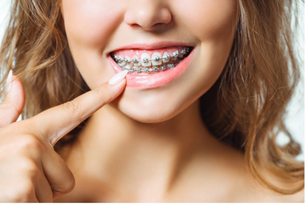 A picture containing person, child, hair, cosmetic