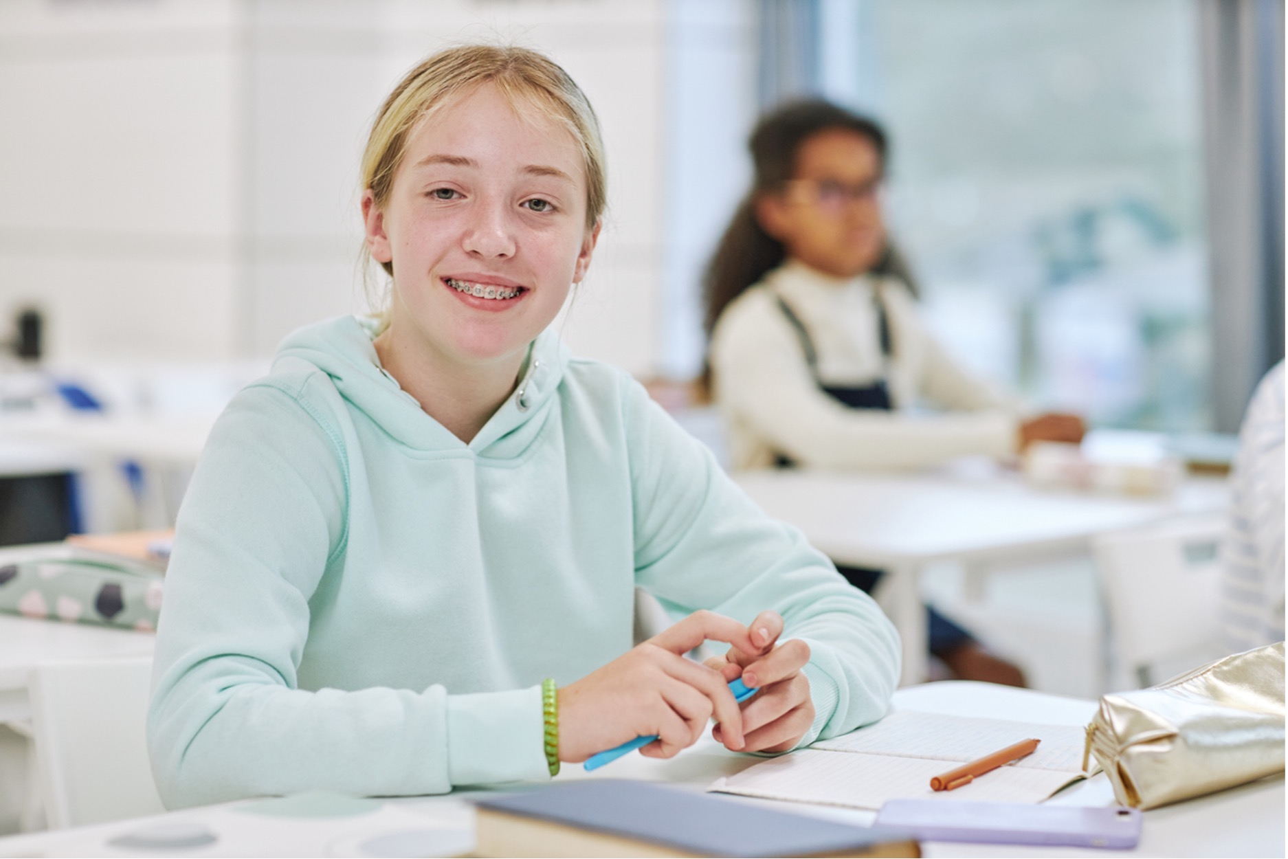Young lady smiling with braces