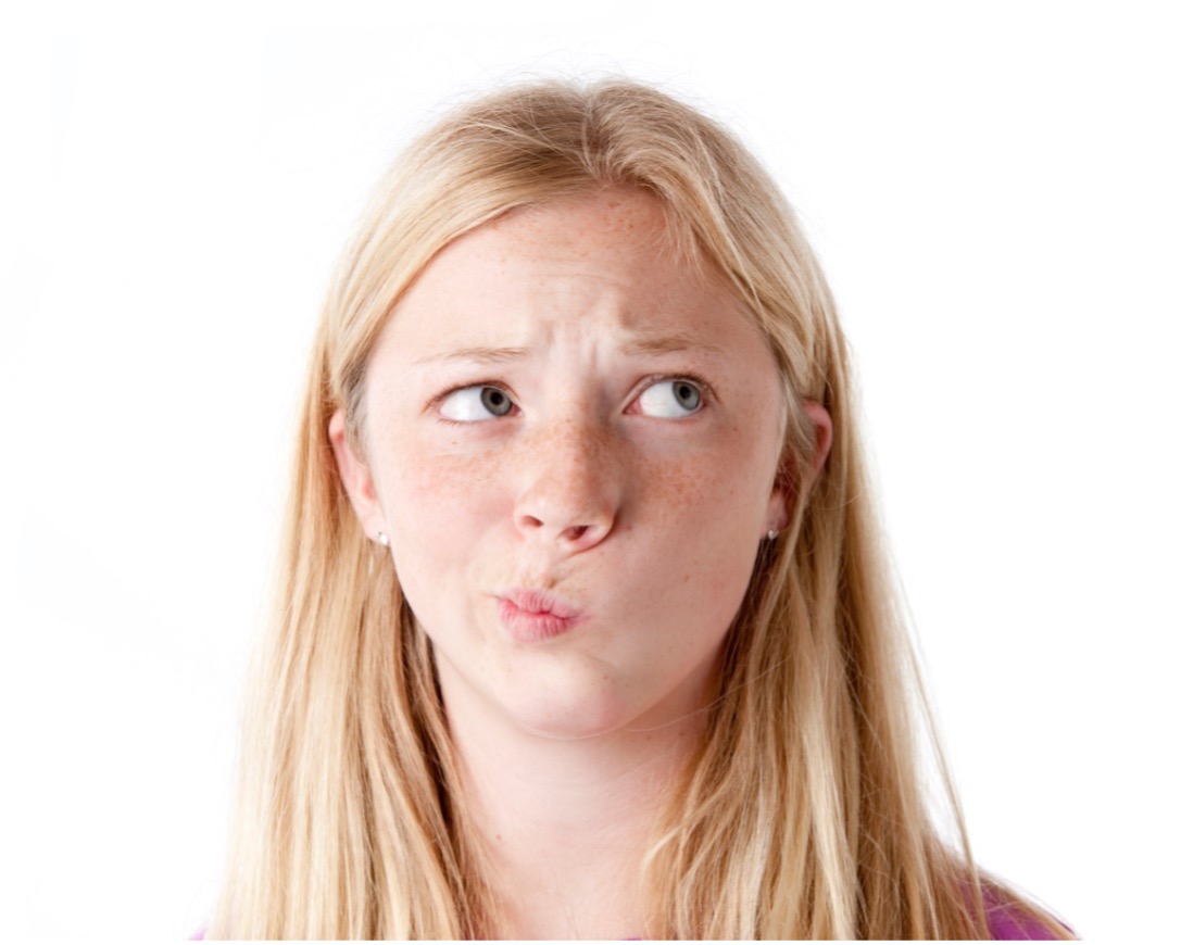 A person making a face, Choosing Between Clear Aligners and Braces