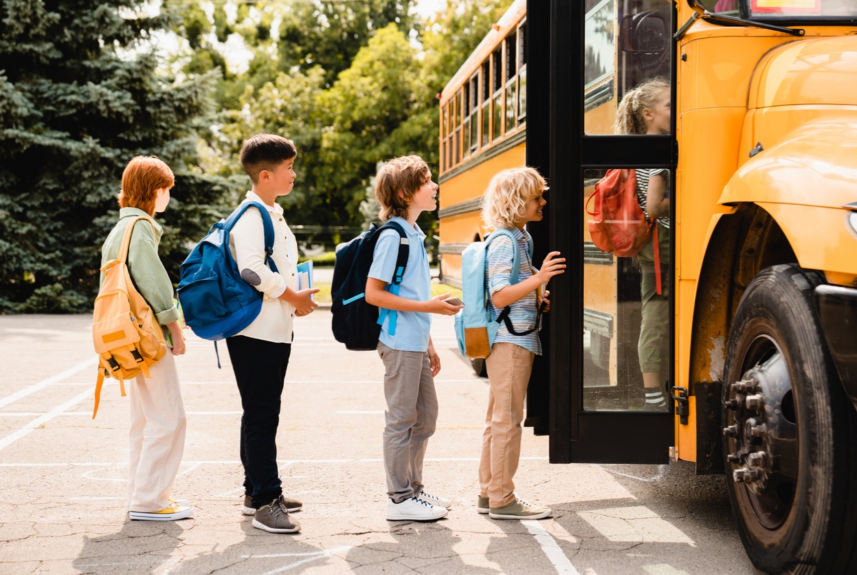 School-Friendly Orthodontic Options: What’s Best for Your Student?, A group of kids waiting for the school bus
